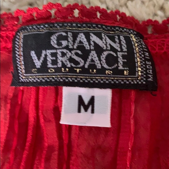 A sheer Versace v-neck with sequence detail - Picture 2 of 3